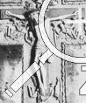3dimensional ausgeformte Jesusfigur am Kreuz auf dem Stoff