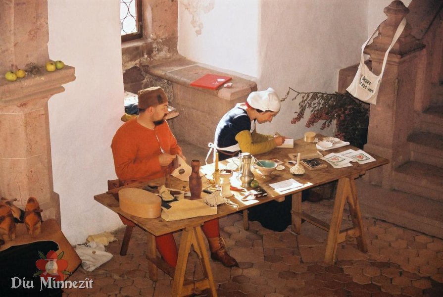 Spätmittelalterlicher Taschenmacher und Holzschnittmacherin